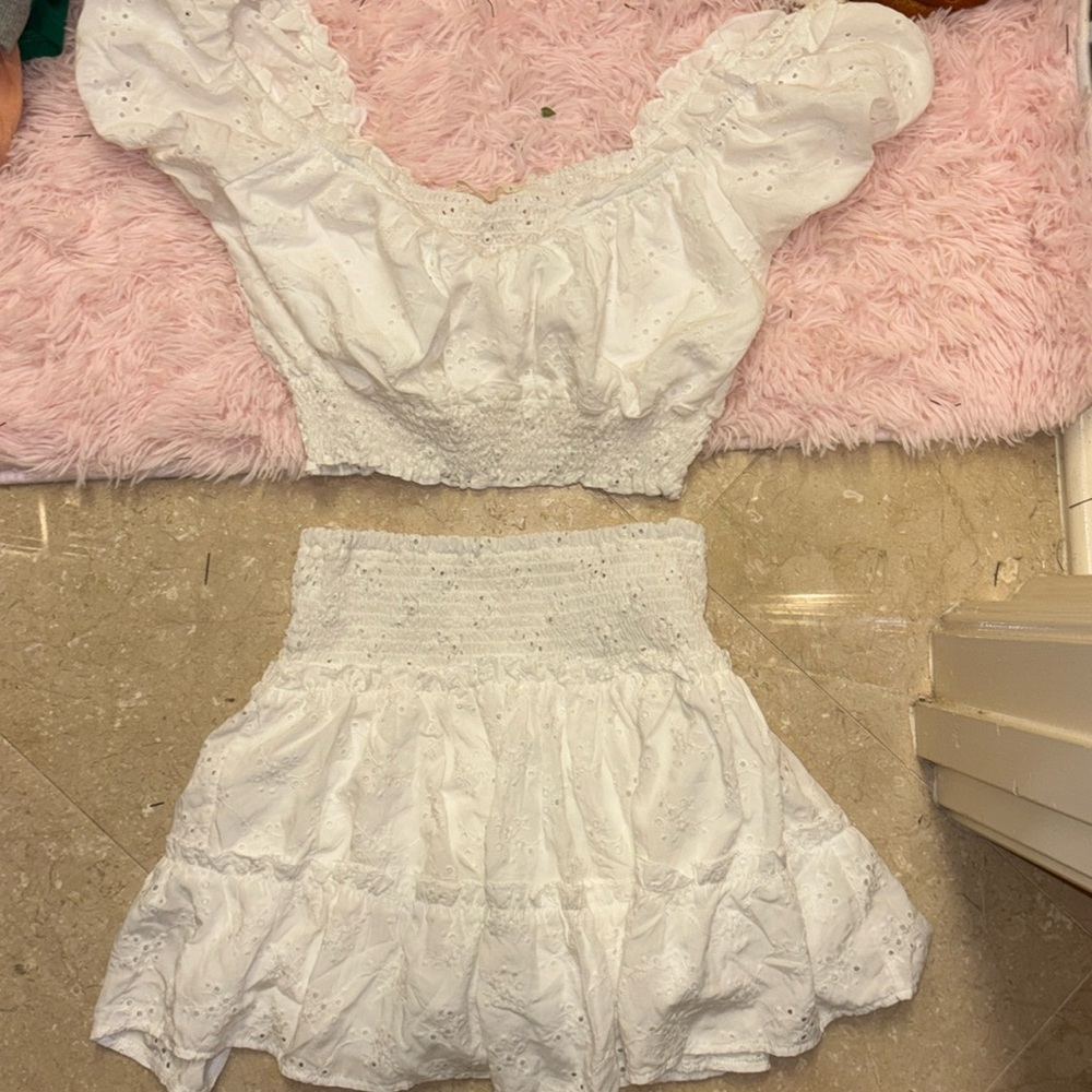 ocean drive white set worn one time 
top size: small 
bottom size: medium